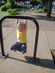 Amelia shows off her strength at a park in Chicago.